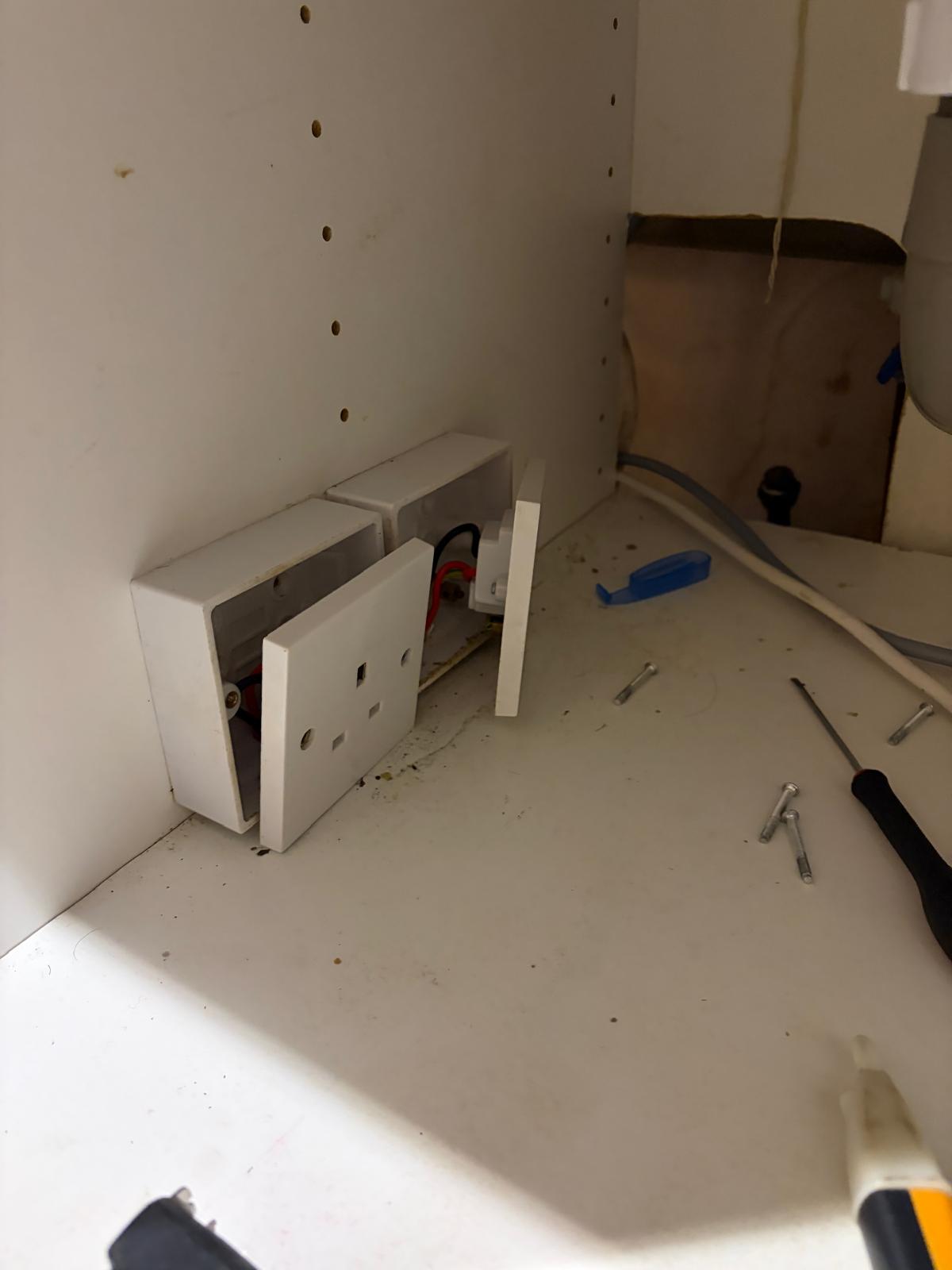 electrical socket troubleshooting inside cabinet in NW4 London
