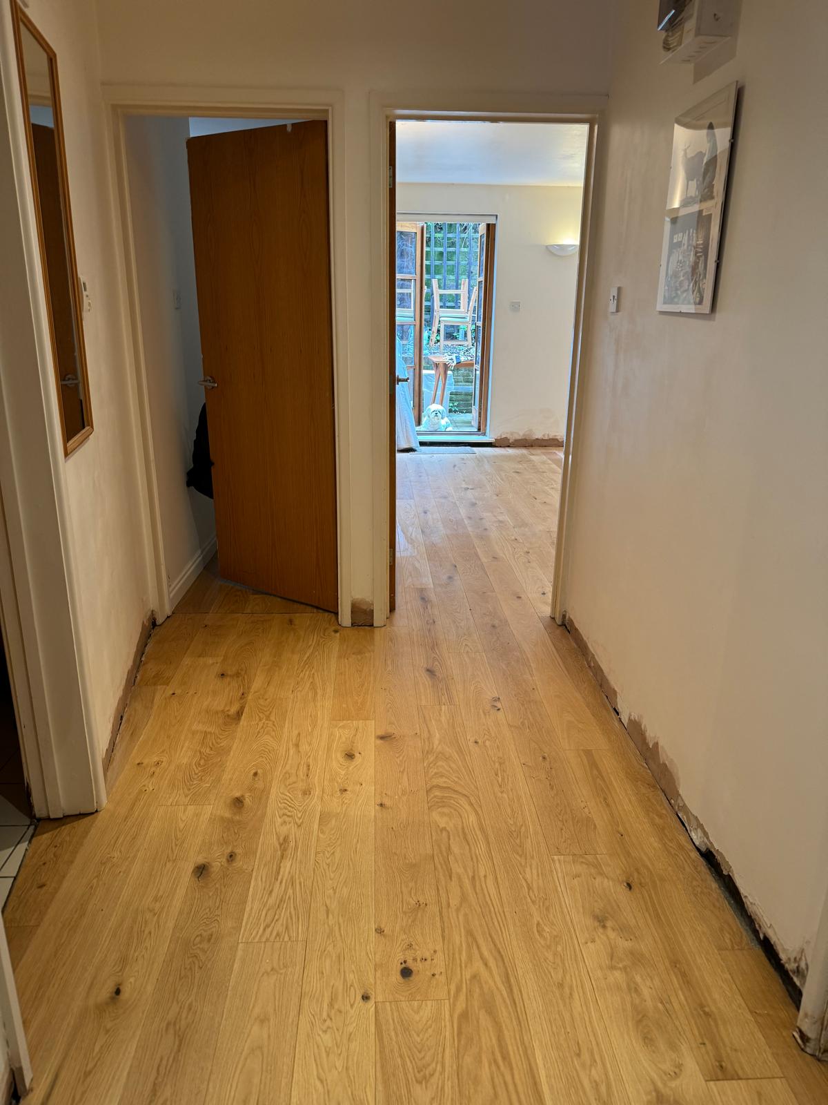 Continuous laminate floor installation in N8 London