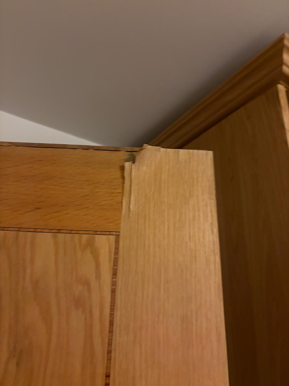 Damaged edge of a wooden internal door, St John's Wood NW8