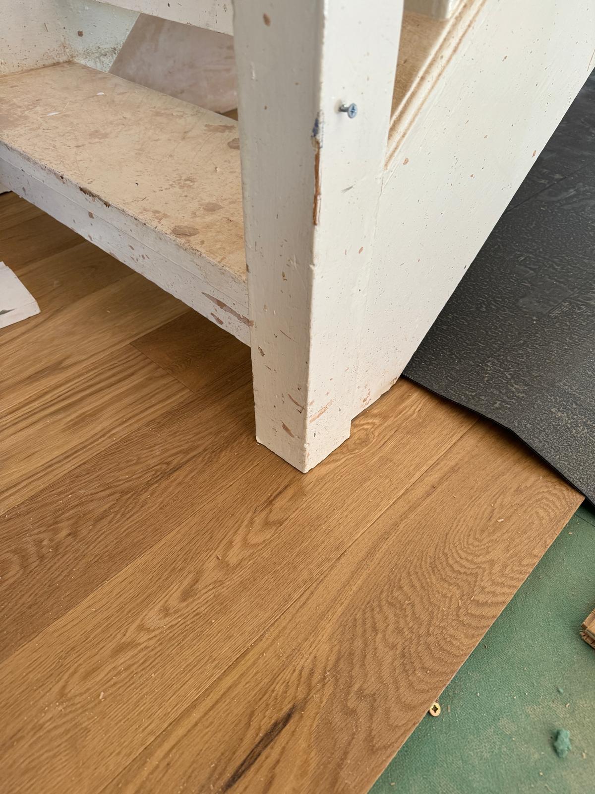 floor fitting under bannister pole